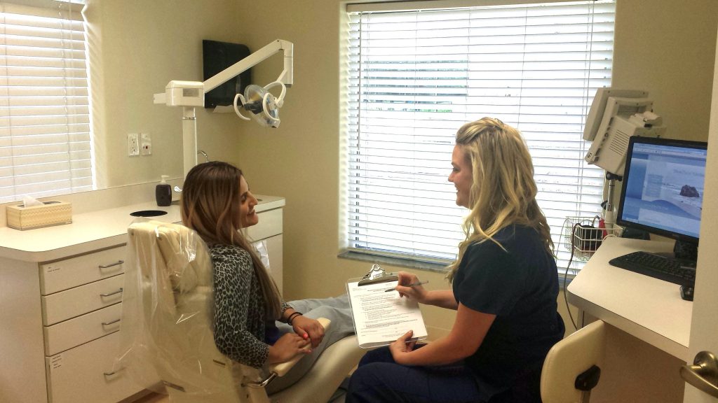 Exam room with Maria and Ellen, Florida Oral & Maxillofacial Surgery Specialists